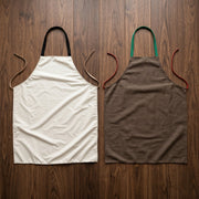 Front view of the kitchen apron highlighting its spacious and convenient pockets.