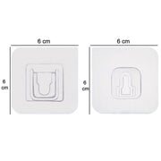 A robust heavy-duty adhesive hook in use, holding multiple items securely.