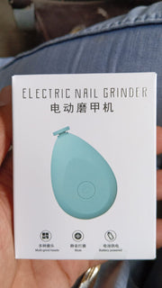 Side view of the ergonomic Baby Electric Nail Trimmer for comfortable infant nail care.