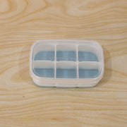 Compact home ice tray in use, perfect for small freezers and daily needs.