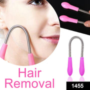 Close-up view of the flexible spring mechanism of the facial hair removal tool.